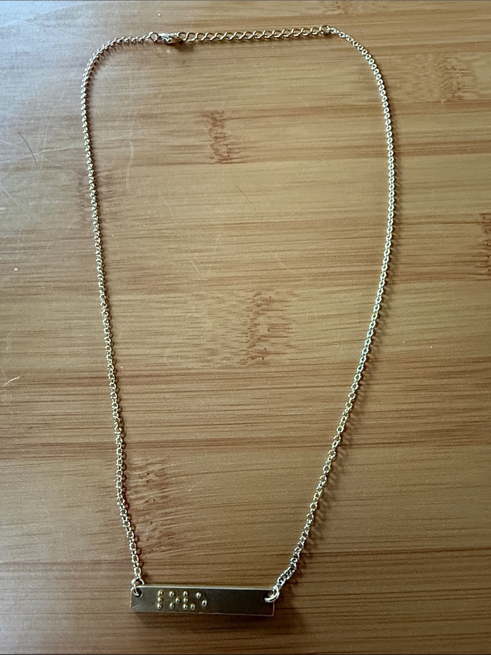Gold-Tone Braille “Love” Horizontal Bar Pendant Necklace